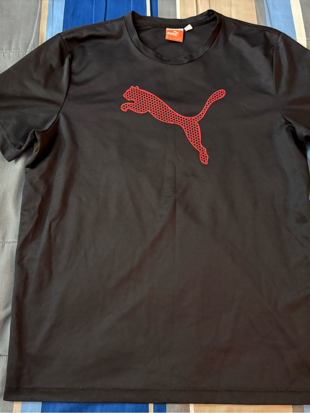 Puma Men’s Black Short Sleeve Tee with Red Logo (M)